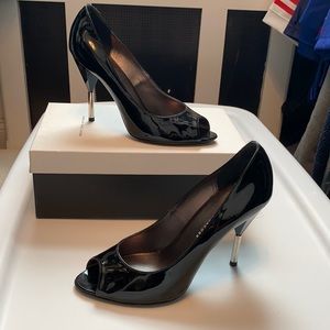 Marc by Marc Jacob, black patent leather stiletto. Peep toe with silver heel.